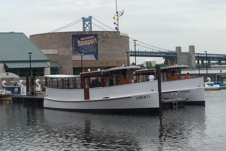 a boat is docked next to a body of water
